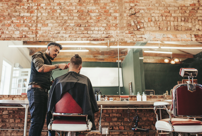 Barber chairs and mirrors inside a barbershop