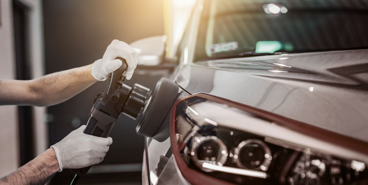 Car being polished during a professional auto detail